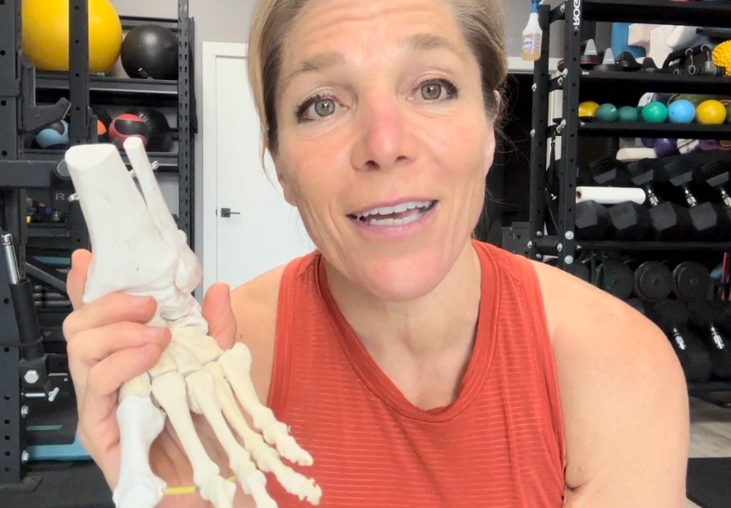 Lisa holding skeleton foot